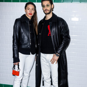 Pierre Niney et sa femme Natasha Andrew - Défilé Ami automne-hiver 2022/2023 dans le cadre de la Fashion Week de Paris, le 19 janvier 2022. @ Olivier Borde/bestimage