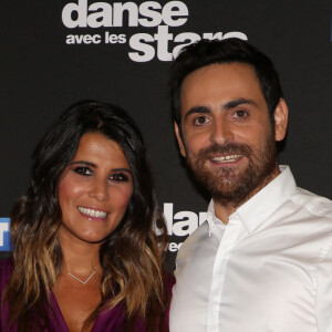 Karine Ferri et Camille Combal - Photocall de la saison 9 de l'émission "Danse avec les stars" (DALS) au siège de TF1 à Boulogne-Billancourt le 11 septembre 2018. © Denis Guignebourg/Bestimage