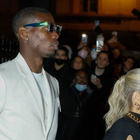 Paul Pogba et sa femme Maria Zulay Salaues - Arrivées et sorties du défilé Off-White Femme Automne/hiver 2022/2023 au palais Brongniart à Paris, France, le 28 février 2022. © Veeren-Christophe Clovis / Bestimage