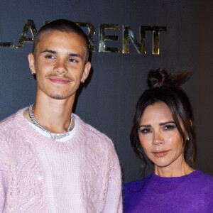 Victoria Beckham et son fils Romeo assistent au défilé Saint-Laurent, collection Prêt-à-porter Automne/Hiver 2022/2023 dans le cadre de la Fashion Week de Paris. Le 1er Mars 2022. © Olivier Borde /Bestimage