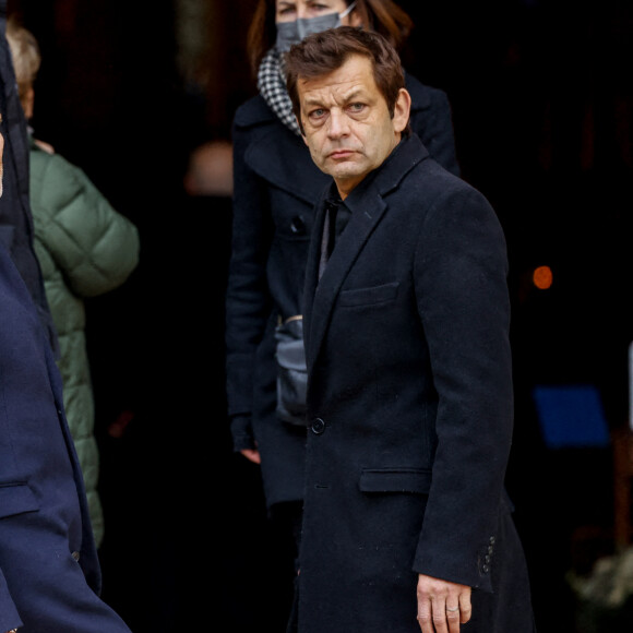Denis Brogniart et Laurent Mariotte - Obsèques de Jean-Pierre Pernaut en la Basilique Sainte-Clotilde à Paris le 9 mars 2022. © Cyril Moreau / Bestimage
