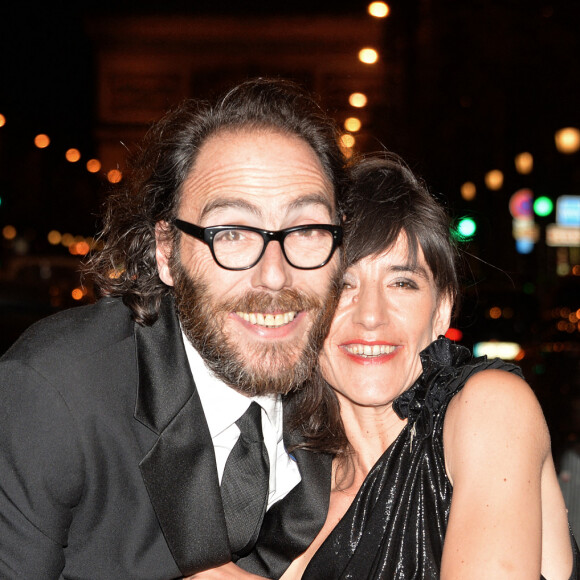 Romane Bohringer et son compagnon Philippe Rebbot - 10e cérémonie des Globes de Cristal au Lido à Paris, le 13 avril 2015.