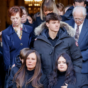 Nathalie Marquay et ses enfants Lou et Tom - La famille de Jean-Pierre Pernaut à la sortie des obsèques en la Basilique Sainte-Clotilde à Paris le 9 mars 2022. © Cyril Moreau/Bestimage