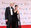 Jake Bongiovi, Millie Bobby Brown - Photocall de la cérémonie des BAFTA 2022 (British Academy Film Awards) au Royal Albert Hall à Londres le 13 mars 2022.