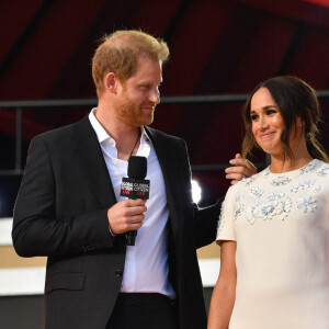 Le prince Harry, duc de Sussex et Meghan Markle sur la scène du "Global Citizen Live Festival" à Central Park à New York, le 25 septembre 2021.