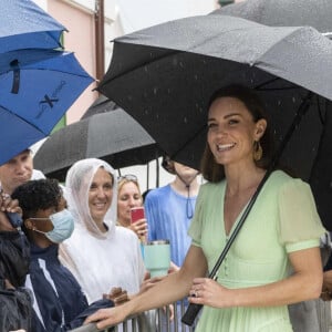 Le prince William, duc de Cambridge, et Catherine (Kate) Middleton, duchesse de Cambridge, assistent à une parade à Nassau, aux Bahamas, le 25 mars 2022. 