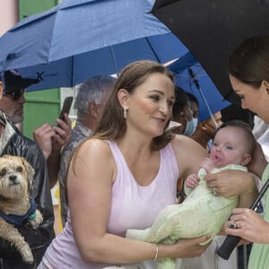 Le prince William, duc de Cambridge, et Catherine (Kate) Middleton, duchesse de Cambridge, assistent à une parade à Nassau, aux Bahamas, le 25 mars 2022. 