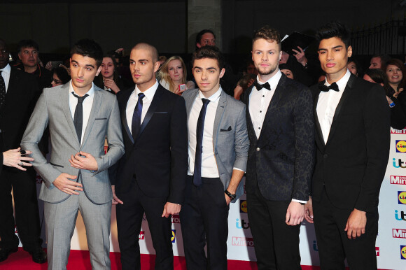 Tom Parker, Max George, Nathan Sykes, Jay McGuinness and Siva Kaneswaran du groupe The Wanted à la Pride of Britain awards en 2013 à Londres. Ian West/PA Wire