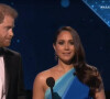 Le prince Harry, duc de Sussex, et Meghan Markle, duchesse de Sussex, rendent hommage au peuple ukrainien lors de la cérémonie des NAACP Image Awards à Los Angeles au cours de laquelle ils ont accepté le "Prix du président" pour leur travail d'aide à un refuge pour femmes du Texas. Le 27 février 2022.  Prince Harry and Meghan Markle paid tribute to the people of Ukraine as they accepted the President's Award at the NAACP Image Awards. The Duke and Duchess of Sussex appeared on stage on to accept the President's Award in recognition of special achievement and distinguished public service. As they accepted the award for their work helping a Texas women's shelter, promoting vaccine equity and creating community relief centers, Harry first wanted to address the conflict in Ukraine following Russia's invasion this week. He said: “We would like to acknowledge the people of Ukraine, who urgently need our continued support as a global community.” Harry added that he was grateful for being honored by the NAACP and that he and his wife were meant to be together to help others despite their supposed differences. He said: I think it's safe to say that I come from a very different background from my incredible wife, yet our lives were brought together for a reason. We share a commitment to a life of service, a responsibility to combat injustice and a belief that the most often overlooked are the most important to listen to.” The NAACP ceremony is their first major Hollywood event since leaving the royal family as they rubbed shoulders with host Anthony Anderson and dozens of A-listers. When receiving their award, Megan said: “I couldn't be prouder that we're doing this work together. We moved to California, my home state, shortly before the murder of George Floyd. For black America, those nine minutes and 29 seconds transcended time, invoking centuries of our unhealed wounds. In the months that followed, as my husband and I spoke with the civil rights community, we committed ourselves and our organization, Archewell, to illuminating those who are advancing racial justice and progress.” Derrick Johnson, President and CEO of the NAACP, said in a statement that it was a thrill to honor Harry and Meghan for their work to support 'equity both in the US and around the world'. Johnson added: “Not only do they continue to lead by example, The Duke and Duchess have also decided to inspire the next generation of activists through the NAACP-Archewell Digital Civil Rights Award, ensuring the support and recognition of generations of civil rights leaders to come". Los Angeles. February 27th, 2022. 