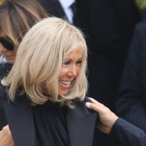 Brigitte Macron et Nicolas Sarkozy - Sorties de la messe funéraire en hommage à Bernard Tapie en l'église Saint-Germain-des-Prés à Paris. Le 6 octobre 2021