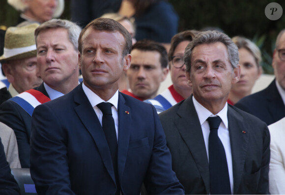 Le président Emmanuel Macron, Nicolas Sarkozy lors du 75ème anniversaire du débarquement en Provence pendant la seconde guerre mondiale à Saint-Raphaël le 15 août 2019