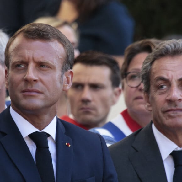Le président Emmanuel Macron, Nicolas Sarkozy lors du 75ème anniversaire du débarquement en Provence pendant la seconde guerre mondiale à Saint-Raphaël le 15 août 2019