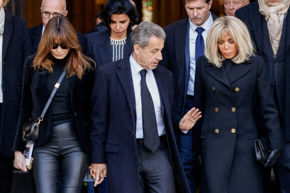 Carla Bruni, Nicolas Sarkozy, Brigitte Macron - Sorties des obsèques de Jean-Pierre Pernaut en la Basilique Sainte-Clotilde à Paris le 9 mars 2022