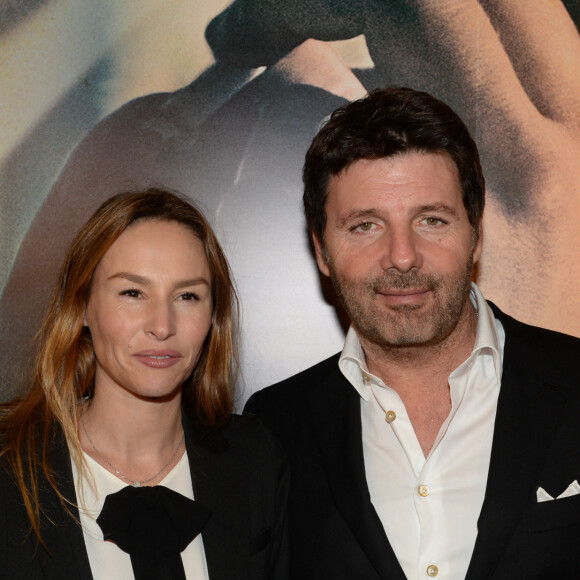 Philippe Lellouche et sa femme Vanessa Demouy lors de l'avant-première du film "La French" au cinéma Gaumont Opéra à Paris, le 25 novembre 2014. 