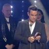 Dita von Teese et Jean-Paul Gaultier remettent le prix de l'artiste international de l'année à Robbie Williams !