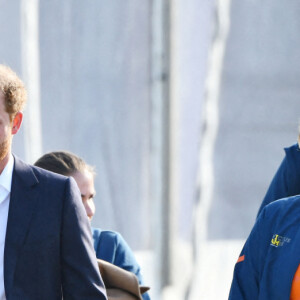 Le prince Harry, duc de Sussex, et Meghan Markle, duchesse de Sussex assistent à un engagement à la veille des Jeux Invictus 2020 aux Pays-Bas, à La Haye, le 15 avril 2022. 