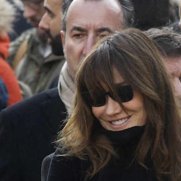 Nicolas Sarkozy et sa femme Carla Bruni-Sarkozy - Obsèques de Jean-Pierre Pernaut en la Basilique Sainte-Clotilde à Paris le 9 mars 2022. © Denis Guignebourg/ Bestimage 