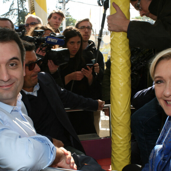 Marine Le Pen et Florian Philippot en visite à la Foire du Trône, porte Dorée, à Paris, France, le 7 avril 2017. © JLPPABestimage 