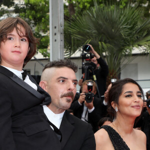 Joachim Lafosse, Gabriel Merz Chammah (petit-fils de I.Huppert), Damien Bonnard, Leïla Bekhti - Montée des marches du film " Les intranquilles " lors du 74ème Festival International du Film de Cannes. Le 16 juillet 2021 © Borde-Jacovides-Moreau / Bestimage 