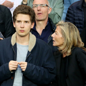 Exclusif - Claire Chazal avec son fils François Poivre d'Arvor et un ami assistent au quart finale de la Ligue des Champions de football au Parc des Princes entre le PSG et le FC Barcelone à Paris le 15 avril 2015.