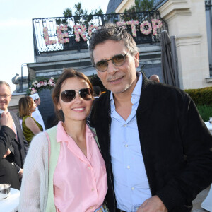 Exclusif - Virginie Ledoyen et Pascal Elbé à la soirée de réouverture du Rooftop de l'hôtel The Peninsula Paris le 10 mai 2022. © Rachid Bellak / Bestimage 