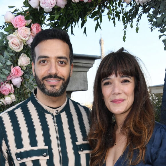 Exclusif - Tarek Boudali et Mélanie Doutey à la soirée de réouverture du Rooftop de l'hôtel The Peninsula Paris le 10 mai 2022. © Rachid Bellak / Bestimage 