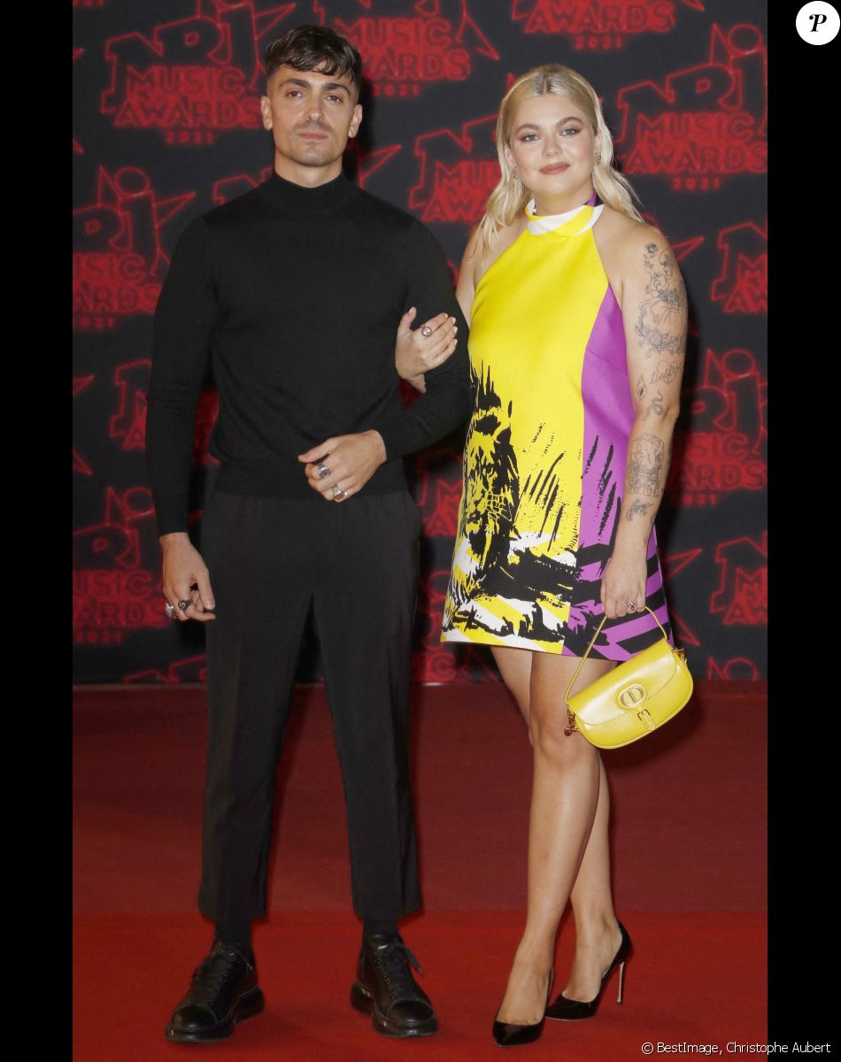Florian Rossi et sa compagne Louane Emera lors de la 23ème édition des NRJ Music Awards 2021 au Palais des Festivals de Cannes, le 20 novembre 2021. © Christophe Aubert via Bestimage