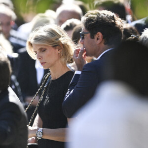 Sylvie Tellier et son mari Laurent - Sortie des obsèques d'Antoine Alléno (fils du chef cuisinier français, trois étoiles au Guide Michelin Yannick Alléno) en la collégiale Notre-Dame de Poissy. © Jean-Baptiste Autissier/Panoramic/Bestimage