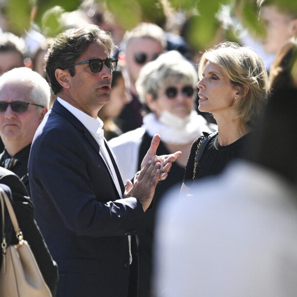 Sylvie Tellier et son mari Laurent - Sortie des obsèques d'Antoine Alléno (fils du chef cuisinier français, trois étoiles au Guide Michelin Yannick Alléno) en la collégiale Notre-Dame de Poissy, France, le 13 mai 2022. © Jean-Baptiste Autissier/Panoramic/Bestimage