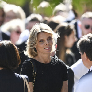 Sylvie Tellier et son mari Laurent - Sortie des obsèques d'Antoine Alléno (fils du chef cuisinier français, trois étoiles au Guide Michelin Yannick Alléno) en la collégiale Notre-Dame de Poissy, France, le 13 mai 2022. © Jean-Baptiste Autissier/Panoramic/Bestimage