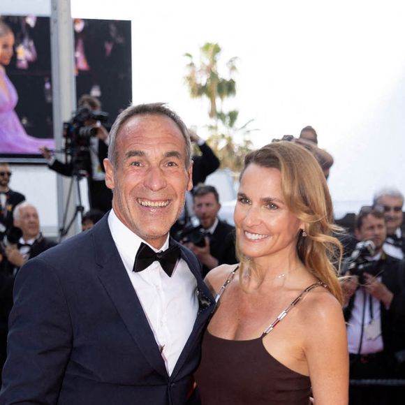 Mike Horn et sa compagne - Montée des marches du film " Triangle of Sadness (Sans filtre) " lors du 75ème Festival International du Film de Cannes. Le 21 mai 2022 © Cyril Moreau / Bestimage 