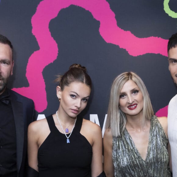 Thylane Blondeau, Baptiste Giabiconi - Photocall de la soirée des 40 ans du bijoutier "APM Monaco" à la plage La Môme lors du 75ème Festival International du Film de Cannes le 21 mai 2022. © Jack Tribeca / Bestimage 