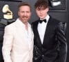 David Guetta et son fils Tim Elvis au photocall de la 64e édition des Grammy Awards au MGM Grand Garden à Las Vegas le 3 avril 2022.