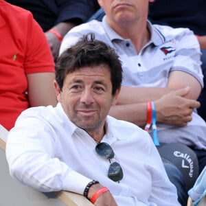 Patrick Bruel et son fils Léon - Célébrités dans les tribunes des internationaux de France de Roland Garros à Paris le 31 mai 2022. © Cyril Moreau - Dominique Jacovides/Bestimage 