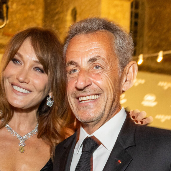 Carla Bruni et son mari Nicolas Sarkozy - Personnalités à la soirée "Women In Motion" par Kering au Château de la Castre lors du 75ème Festival International du Film de Cannes. Le 22 mai 2022 © Olivier Borde / Bestimage