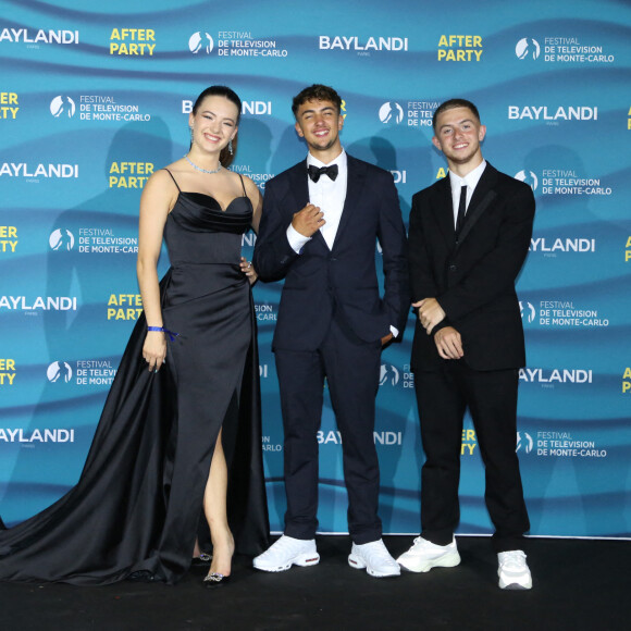 Michou, Elsa Bois et Inoxtag au photocall de l'after party de la cérémonie d'ouverture de la 61ème édition du Festival de Télévision de Monte-Carlo au Monte Carlo Beach, à Monaco, le 17 juin 2022. © Denis Guignebourg/BestImage 