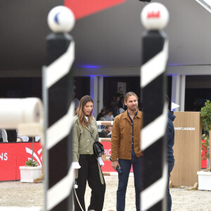 Camille Cerf (Miss France 2015 et Ambassadrice du LGCT-LPEJ 2022), son compagnon Théo Fleury et le chien Romeo - 8ème édition du "Longines Paris Eiffel Jumping" au Champ de Mars à Paris, le 25 juin 2022. © Perusseau/Gorassini/Tribeca/Bestimage