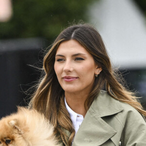 Camille Cerf (Miss France 2015 et Ambassadrice du LGCT-LPEJ 2022), son compagnon Théo Fleury et le chien Romeo - 8ème édition du "Longines Paris Eiffel Jumping" au Champ de Mars à Paris, le 25 juin 2022. © Jean-Baptiste Autissier/Panoramic/Bestimage