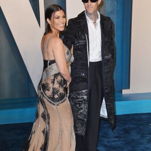 Kourtney Kardashian, Travis Barker au photocall de la soirée "Vanity Fair" lors de la 94ème édition de la cérémonie des Oscars à Los Angeles, le 27 mars 2022. 