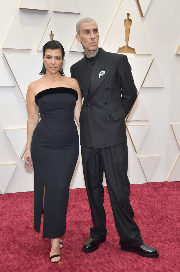Kourtney Kardashian, Travis Barker au photocall de la 94ème édition de la cérémonie des Oscars à Los Angeles