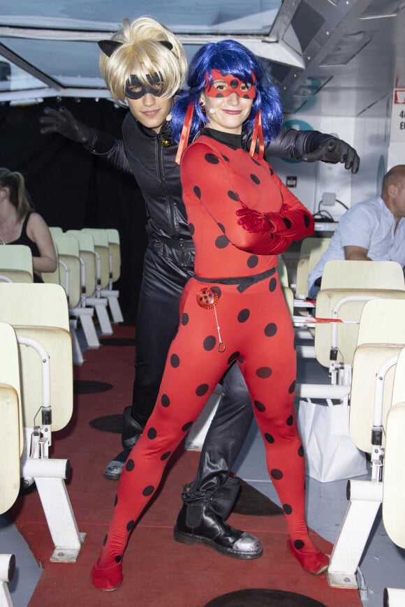 Chat Noir et Ladybug - People lors de l'événement "La croisière Miraculous" à Paris. Le 29 juin 2022 © Christophe Aubert via Bestimage