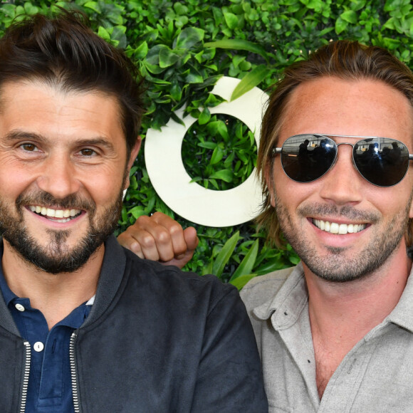 Christophe Beaugrand et son mari Ghislain Gerin - 5 ans de la marque Joone, sur la péniche La Barge à Issy-les-Moulineaux. Paris, le 30 juin 2022. © Veeren / Bestimage