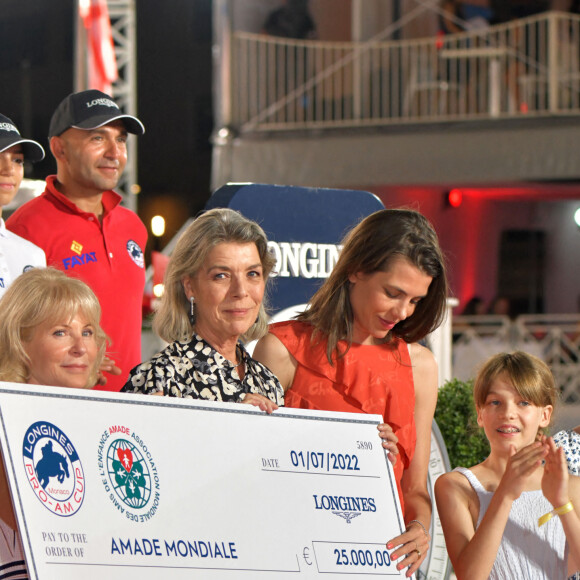 Diane Fissore, la présidente de la Fédération Equestre Monégasque et organisatrice du Jumping, Charlotte Casiraghi et sa mère la princesse Caroline de Hanovre durant le Jumping International de Monaco, 16eme édition du Longines Global Champions Tour, le 1er juillet 2022. Ici, lors de la remise des prix du Longines Pro-Am Cup Monaco, c'est le binôme composé par le français Olivier Robert et la britanique Isabella Beecroft Luckett qui ont remporté la compétition en deux manche. © Bruno Bebert / Bestimage 