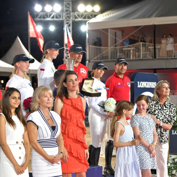 Diane Fissore, la présidente de la Fédération Equestre Monégasque et organisatrice du Jumping, Charlotte Casiraghi et sa mère la princesse Caroline de Hanovre durant le Jumping International de Monaco, 16eme édition du Longines Global Champions Tour, le 1er juillet 2022. Ici, lors de la remise des prix du Longines Pro-Am Cup Monaco, c'est le binôme composé par le français Olivier Robert et la britanique Isabella Beecroft Luckett qui ont remporté la compétition en deux manche. © Bruno Bebert / Bestimage 