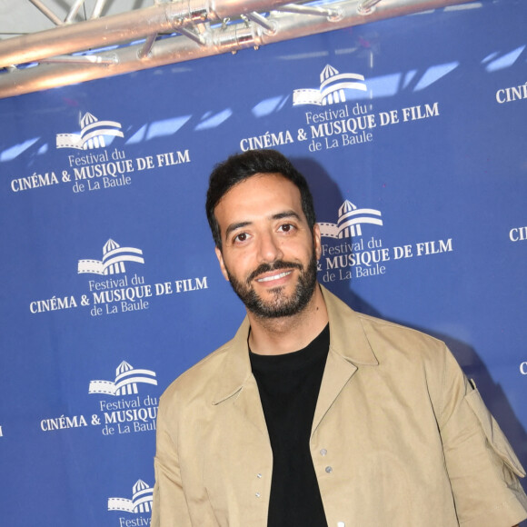 Tarek Boudali - Photocall de la cérémonie de clôture du 8ème Festival du Cinéma et Musique de Film de La Baule le 3 juillet 2022. © Rachid Bellak/bestimage