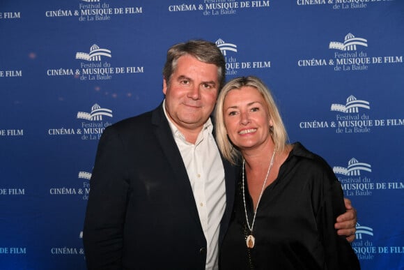Franck Louvrier et sa femme Sophie - Photocall de la cérémonie de clôture du 8ème Festival du Cinéma et Musique de Film de La Baule le 3 juillet 2022. © Rachid Bellak/bestimage