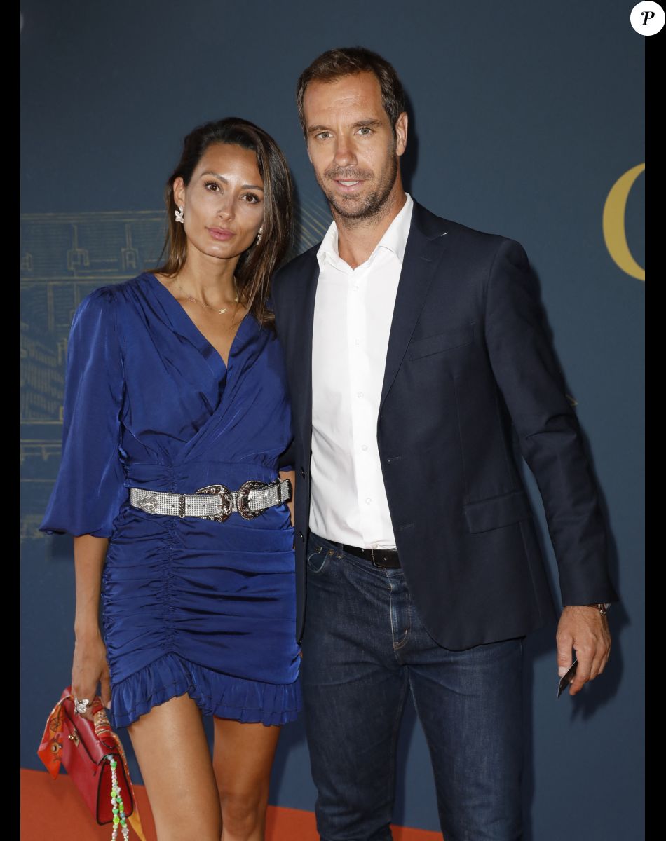 Richard Gasquet et une amie - Soirée de gala "Coeur Central" au profit de Terre d'Impact fonds de dotation de la FFT et de l'association Fête le Mur sur le Court Central Philippe Chatrier à Roland Garros, Paris le 5 juillet 2022. © Marc Ausset-Lacroix/Bestimage