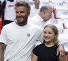 David Beckham avec sa fille Harper lors d'un match de NBA entre Miami et Atlanta.
