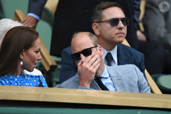 Le prince William, duc de Cambridge, et Catherine (Kate) Middleton, duchesse de Cambridge, dans les tribunes du tournoi de Wimbledon au All England Lawn Tennis and Croquet Club à Londres, Royaume Uni, le 5 juillet 2022. 