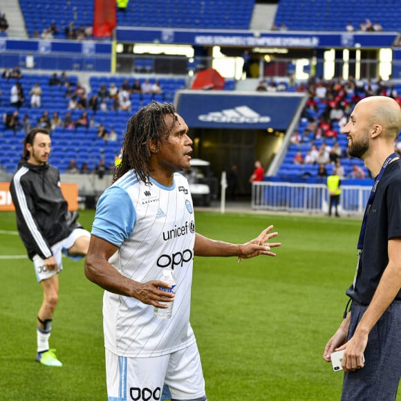 Christian Karembeu et Baptiste Vendroux lors du match de football caritatif "Le match des héros UNICEF" entre l'OL Légendes et la team Unicef en faveur de l'association Aide Médicale & Caritative France-Ukraine (AMC France-Ukraine) au Groupama Stadium à Lyon, France, le 10 mai 2022. Victoire de Lyon 1 à 0, but de Sonny Anderson. La somme de 482 490€ a été récoltée pour les enfants d'Ukraine. © Pierre Perusseau/Bestimage